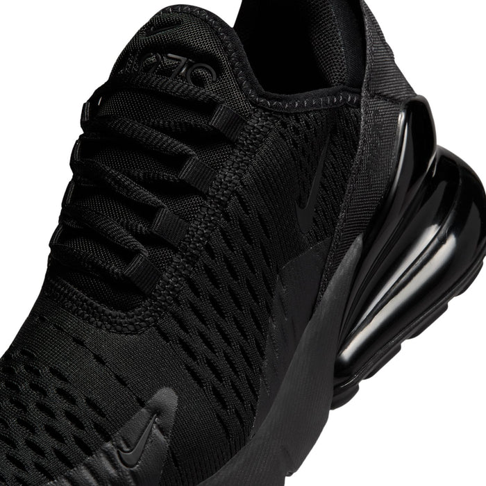 Youth black knit mesh upper close-up with lace eyelets and logo detailing