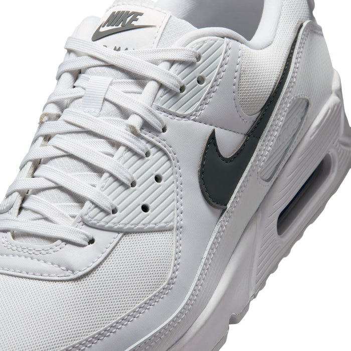 Men's Air Max 90 sneakers upper close-up, white mesh with dark swoosh on side