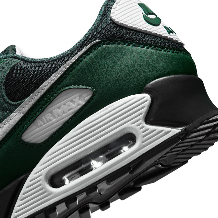 Air Max 90 side close-up showing dark green leather trim and clear air unit in black sole