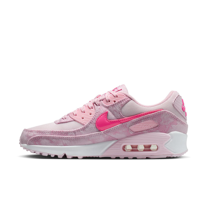 Pink Air Max 90-style running shoe with lace-up closure, swoosh logo, and air unit sole