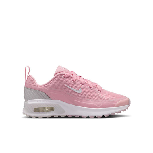 Youth running sneaker in medium soft pink with white Swoosh and visible air unit sole