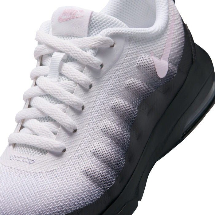 Kids sneaker upper close-up, white laces, light gray mesh with pink-tinted Swoosh