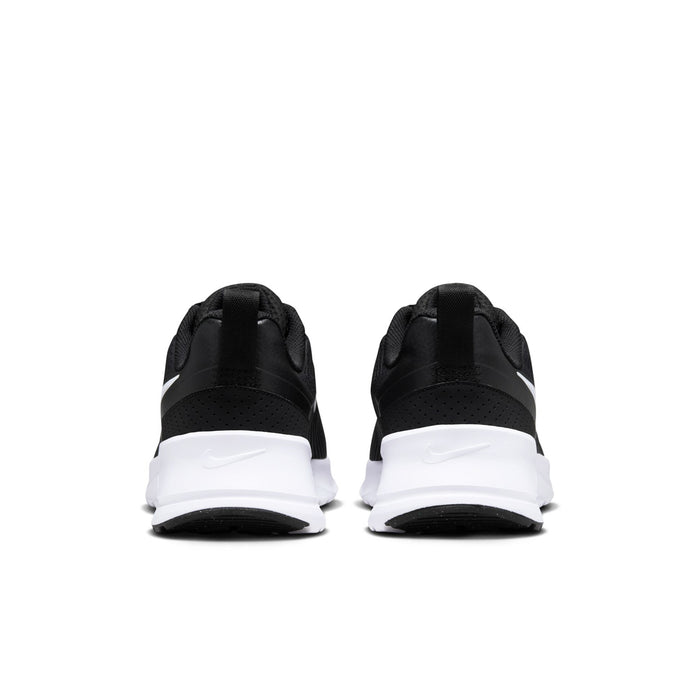 Men's Air Max NuAxis sneakers, back view with black upper and white heel midsole.