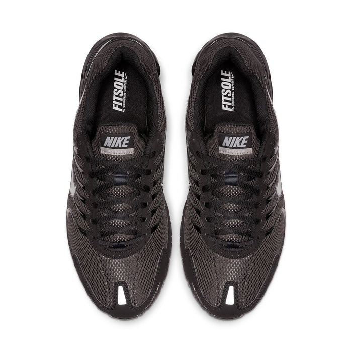 Pair of black Nike sneakers with 'FUSE' label on tongue and Nike logo on insole