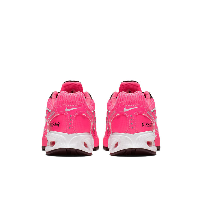 Womens pink Nike Air Max Torch 4 sneakers, rear view with white midsole and red heel accents