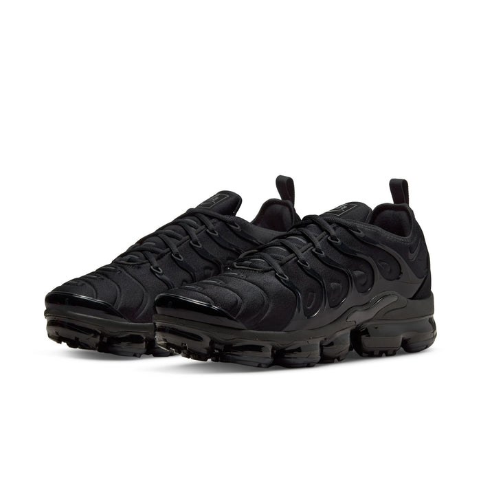 Men's black lace-up performance sneakers, side view with Air cushioning