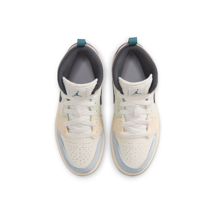 Kids Air Jordan 1 mid-top sneakers, lace-up front with cream tongue and gray lining.