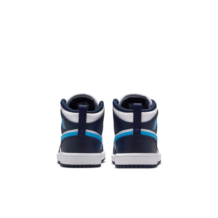Kids mid-top sneakers back view in navy and white with light blue accents