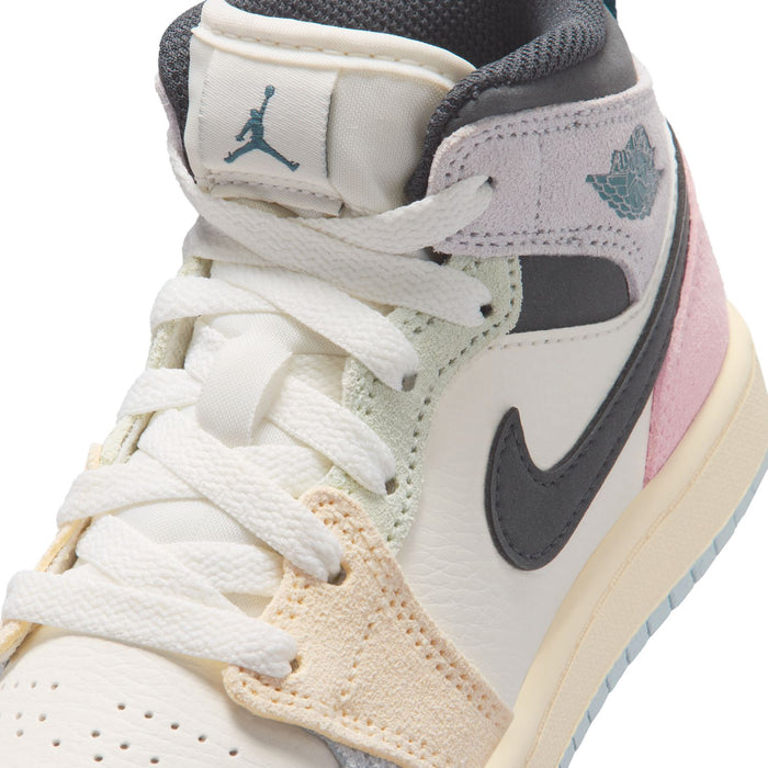 Kids Air Jordan 1 mid-top sneakers, stitched lace-up upper with teal logo detail.