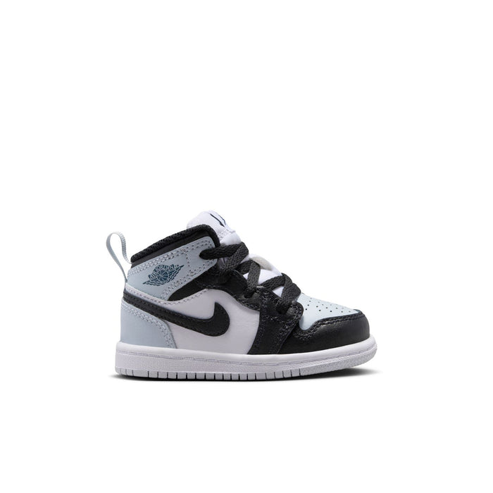 Toddler mid-top sneakers in black, white, and light gray with black laces and swoosh