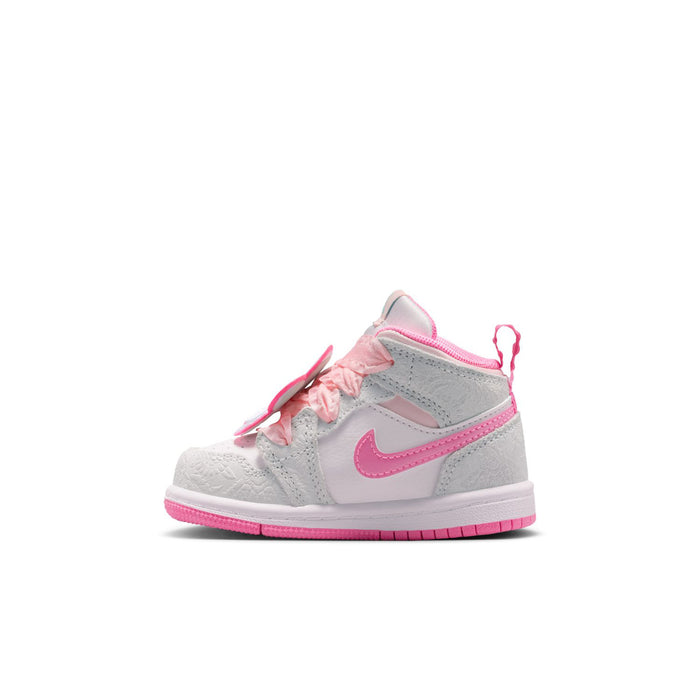 Toddler mid-top sneaker side view in light gray with pink Swoosh and laces