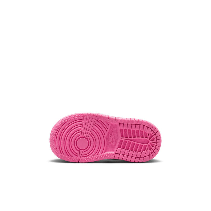 Toddler sneaker outsole in bright pink with textured tread pattern
