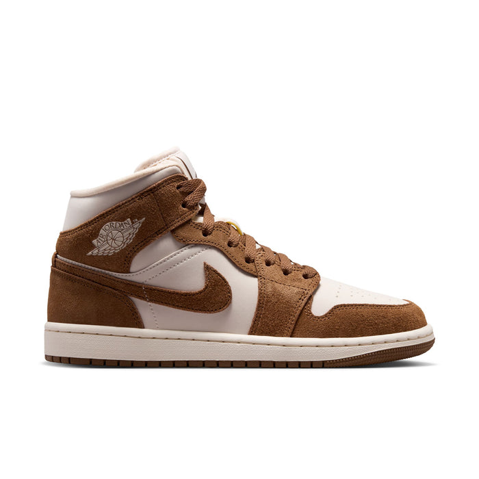 Women's mid-top sneakers in light tan suede with white panels, brown Swoosh, laces