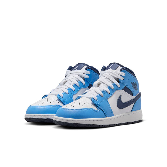 Pair of youth mid-top sneakers, light blue and white uppers with navy accents