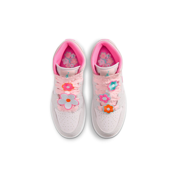 Youth mid-top sneakers top view: light gray uppers with pink floral patches and bright pink insoles.
