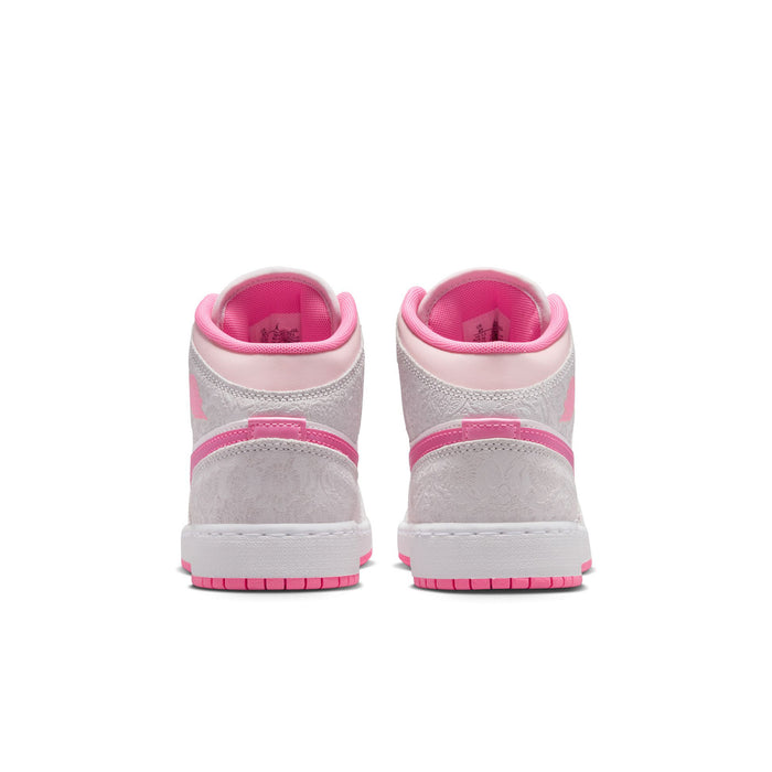 Youth mid-top sneakers in light gray with pink accents; back view with pink lining.