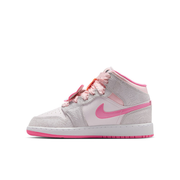 Youth mid-top sneakers, light gray leather with pink swoosh; lace-up front view.