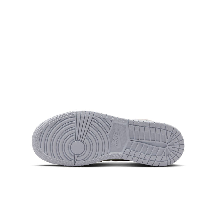 Air Jordan 1 Mid youth outsole view, textured tread on light gray rubber