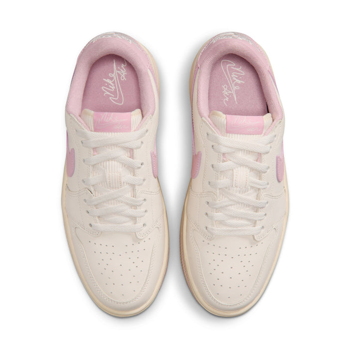Pale ivory low-top sneakers with pink padded collar and white lace-up design