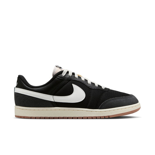 Men's black low-top sneakers with white Swoosh and lace-up design, gum sole