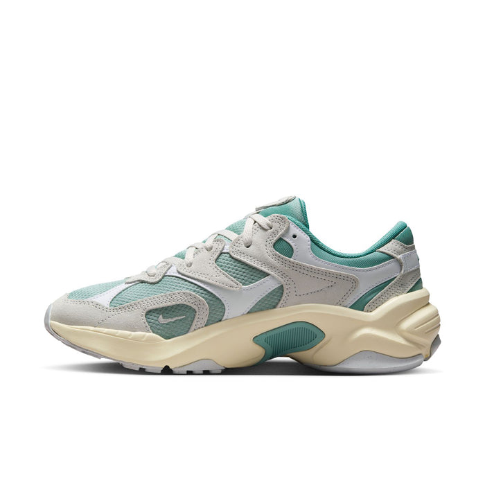 Women's running sneakers, angled side view in light gray and teal with cream accents