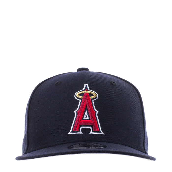 Navy baseball cap with red and white "A" embroidered logo