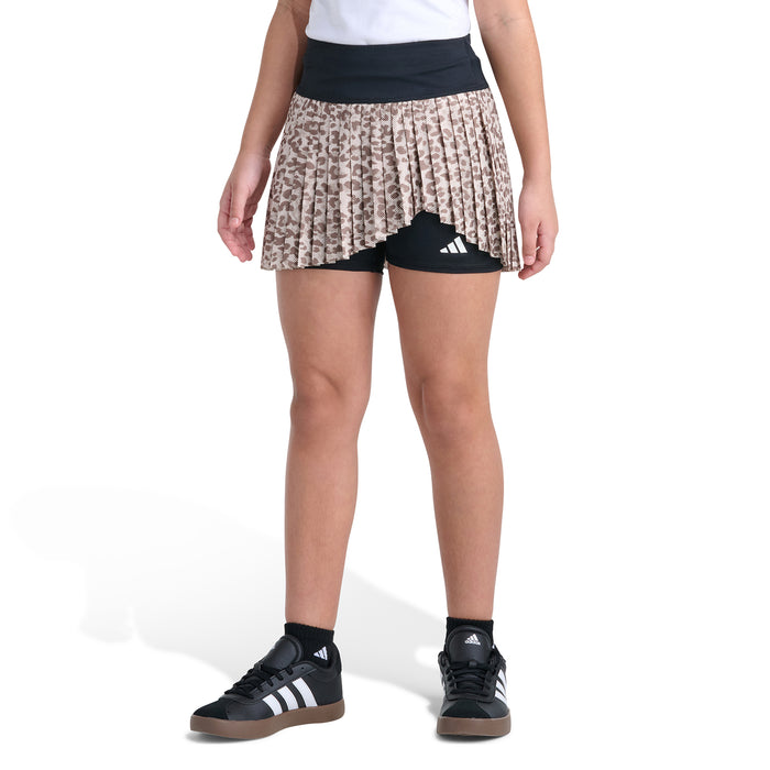Youth mesh pleated skort with leopard print outer, black waistband, and inner shorts