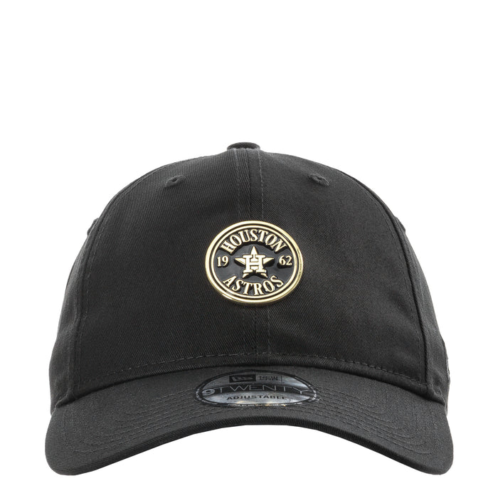 Black baseball cap front with Houston Astros circular gold badge