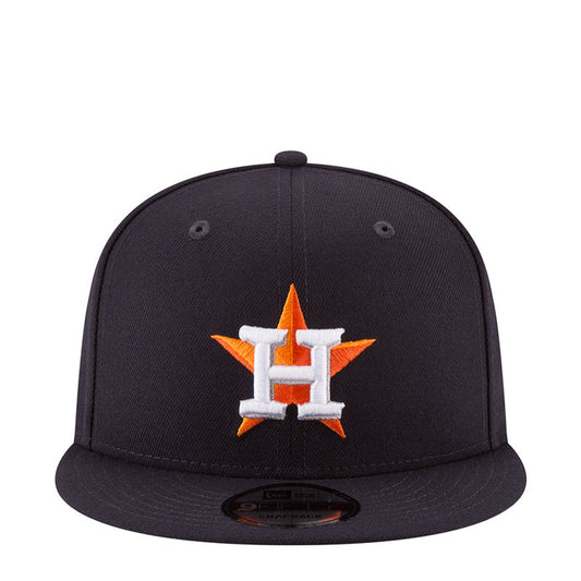 Navy baseball cap with embroidered Astros star logo in orange and white