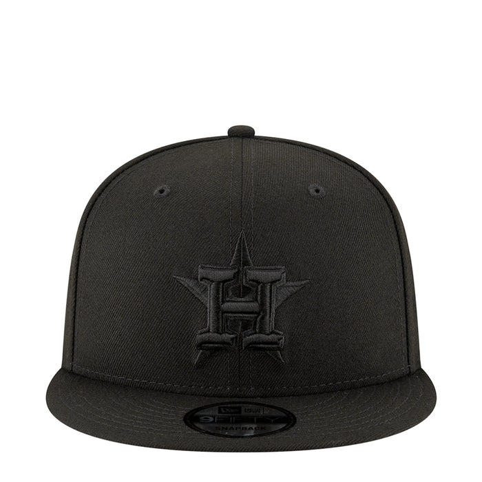 Black baseball cap with embroidered team logo on front