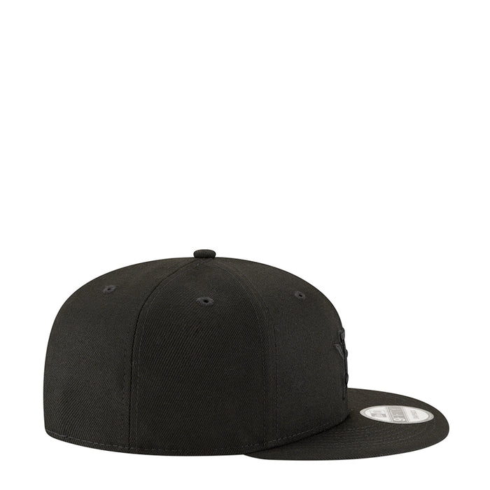 Black baseball cap side view with curved brim