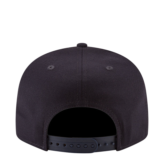 Navy baseball cap with adjustable back strap and ventilation eyelets