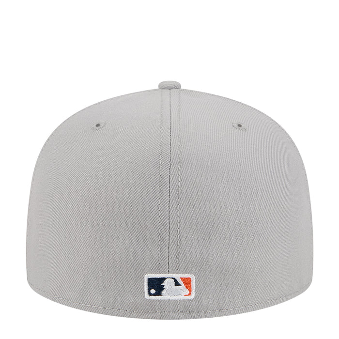 Grey baseball cap with embroidered MLB logo patch at front center