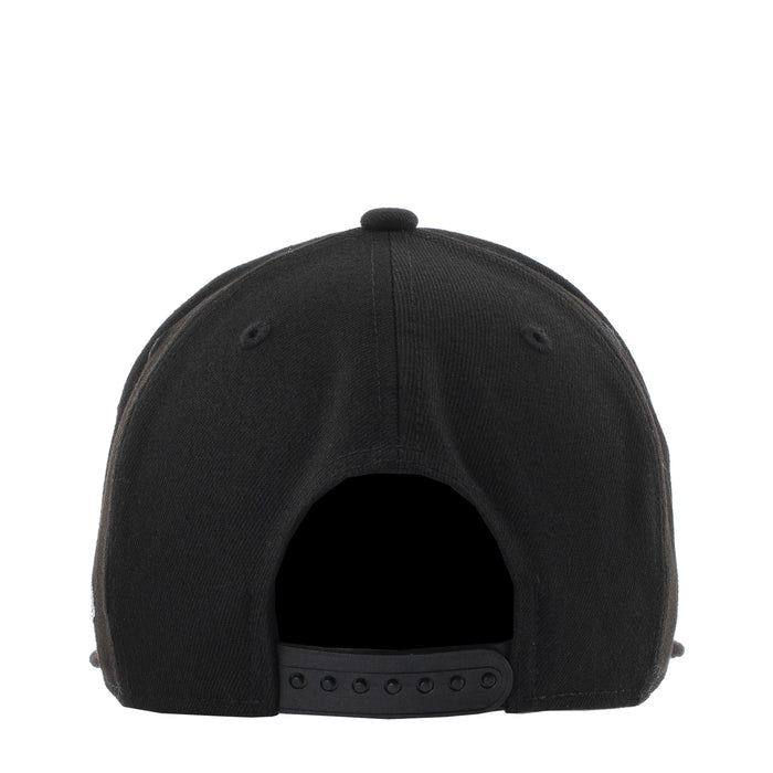 Black baseball cap back view with adjustable strap and metal eyelets