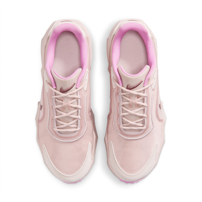 Pair of light pink women’s running sneakers with pink-lined collars and lace-up tops