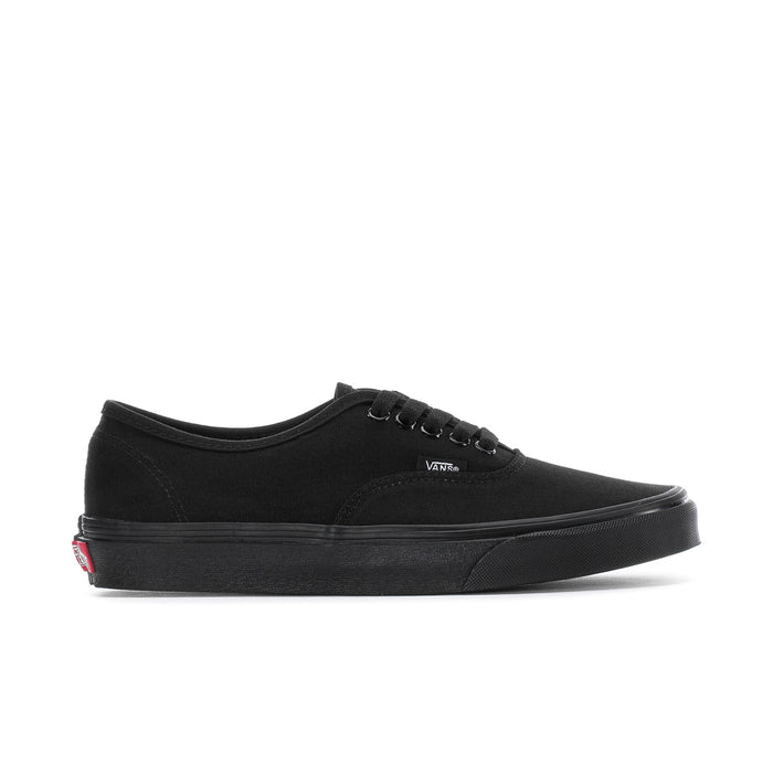 Men's black low-top sneakers with lace-up front and vulcanized sole