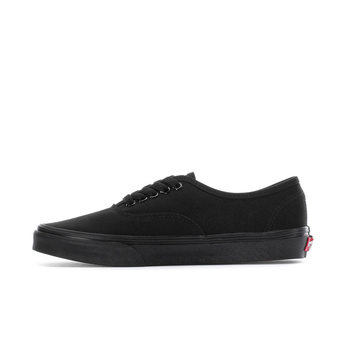 Men's black low-top sneakers with stitched toe cap and lace-up closure