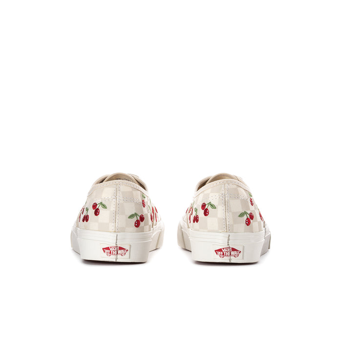 Women’s low-top sneakers from back view with red cherry print and white heel tab