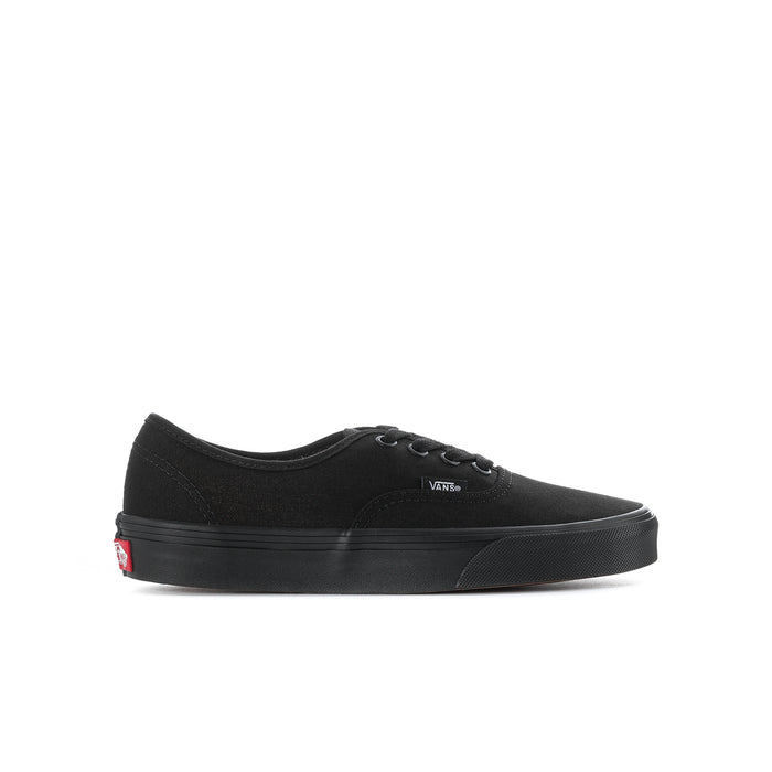 Black youth lace-up sneaker with Vans logo on side and black rubber outsole