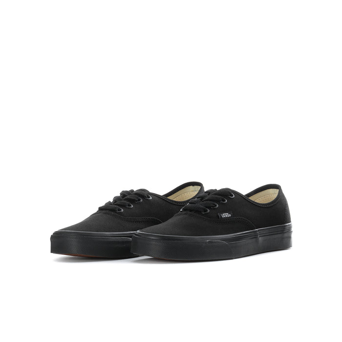 Black youth lace-up sneaker, low-profile canvas upper and sidewall stripe
