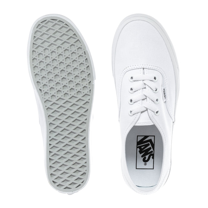 Youth sneaker outsole and inner side view with VANS label on tongue