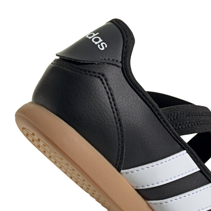 Youth Mary Jane heel close-up, black upper with adidas logo on strap and gum sole