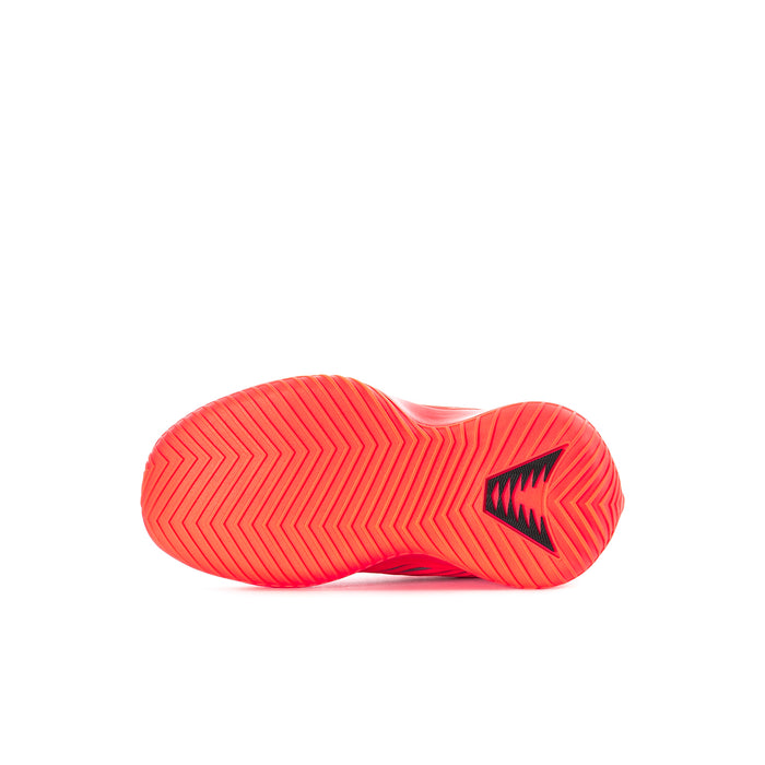 Kids sneaker outsole, bright orange rubber tread with sport logo on heel area.