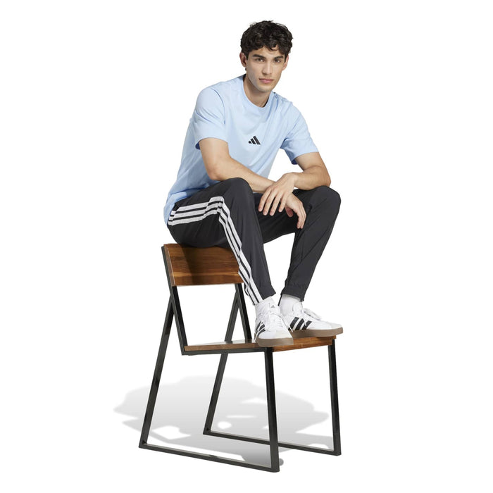 Light blue men's t-shirt with small adidas logo and short sleeves