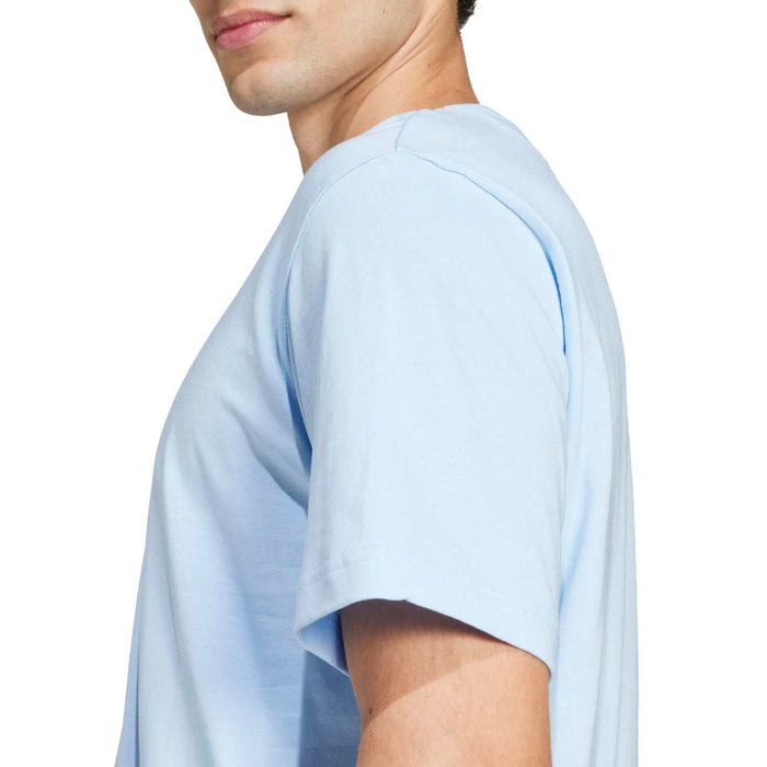 Light blue men's t-shirt, side view with short sleeves and adidas chest logo