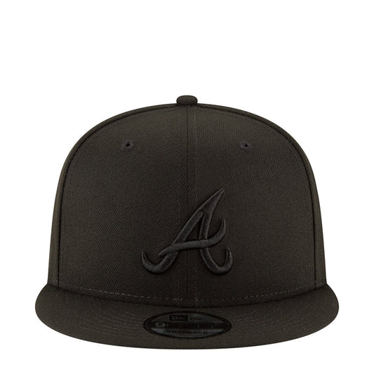 Black baseball cap with embroidered front logo and flat brim