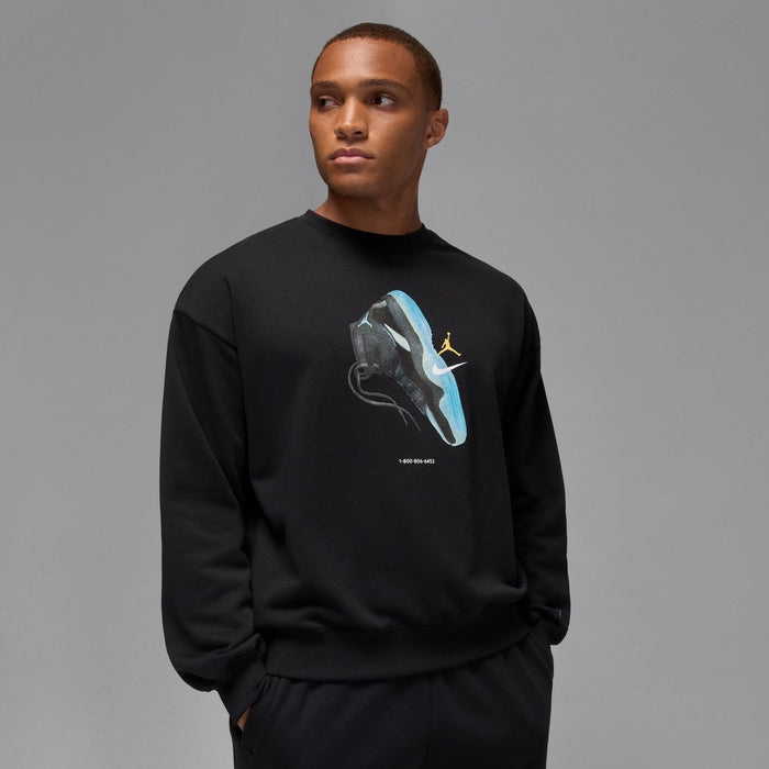 Black crewneck sweatshirt with blue sneaker artwork and yellow Jumpman logo on chest