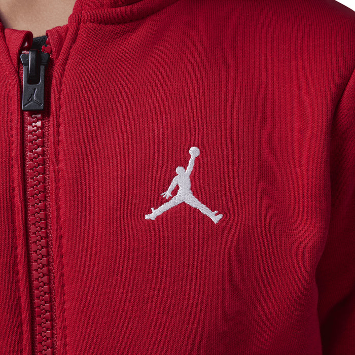 Red fleece zip-up hoodie chest, white Jordan Jumpman logo on front panel