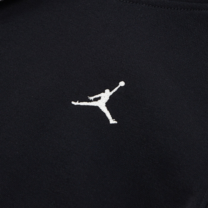 Jumpman logo on black youth fleece pullover hoodie chest.