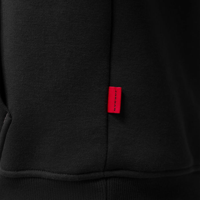 Men's black hoodie with kangaroo pocket; red brand tag on inner seam
